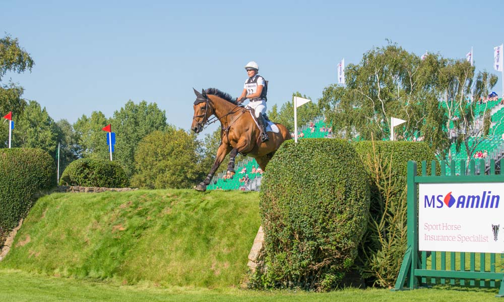 Georgie Strang & Cooley Earl take a Hickstead bank [Photo: Sian Hayden] 