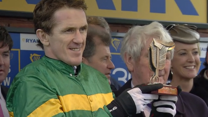 AP with his Ryanair Chase trophy - his wife Chanelle is on the right [Photo: Channel 4 Racing]