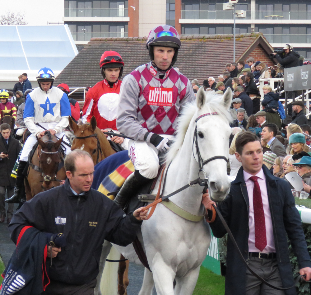 Smad Place & Wayne Hutchinson on their way to the start for Newbury's 2016 Hennessy Gold Cup