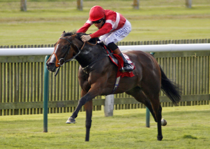 Tiggy Wiggy - with Richard Hughes - wins the Cheveley Park Stakes (September 2014) (photograph by Steven Cargill)